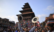 Nepalese devotees playing traditional instruments on a first day of Biska Jatra Festival a...