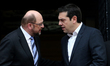 Greek Prime Minister AlexisTsipras (R) and European Parliament President Martin Schulz exi...