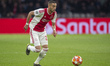 Hakim Ziyech of Ajax runs with the ball during the UEFA Champions League Quarter Final mat...