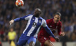 Porto’s Malian forward Moussa Marega (L) in action with Virgil Van Dijk defender of Liverp...