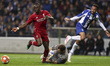Sadio Mane midfielder of Liverpool (L) vies with Porto's Brazilian defender Eder Militao (...