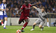 Sadio Mane midfielder of Liverpool (L) vies with Porto's Spanish goalkeeper Iker Casillas...