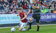 Northampton Town's Sam Hoskins is fouled by Macclesfield Town's David Fitzpatrick during t...