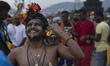 HIndu devotee in a trance as he walk to the Batu Cave temple during a Thaipusam festival i...
