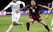 Torino defender Lorenzo De Silvestri (29) fights for the ball against Milan midfielder Luc...