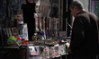 A man looks at items on sale at a kiosk in Bucharest, Romania on April 30, 2019. Romania h...