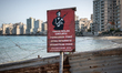 On 24 April 2019, a military sign reading "Forbidden Zone" is visible on a barrier on Palm...