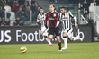  Carlos Tevez and Gabriel Paletta before the first goal during the Serie A match between J...