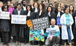 Lawyers, doctors, and members of the community protest cuts to Legal Aid Ontario at Queens...