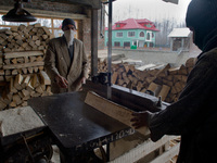 HALMULLAH, INDIAN ADMINISTERED KASHMIR, INDIA - FEBRUARY 11: Workers shape willow cleft used in making cricket bats in a cricket bat factory...