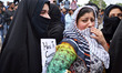 Kashmiri women seen crying during a protest against the rape of a three year old girl in S...