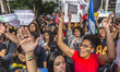 People take part in a demonstration against education cuts and pension reform in Sao Paulo...