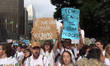 People take part in a demonstration against education cuts and pension reform in Sao Paulo...