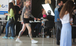 Cyril Litash, who has 25 Marvel characters tattooed on his body, walks to his tattooist to...