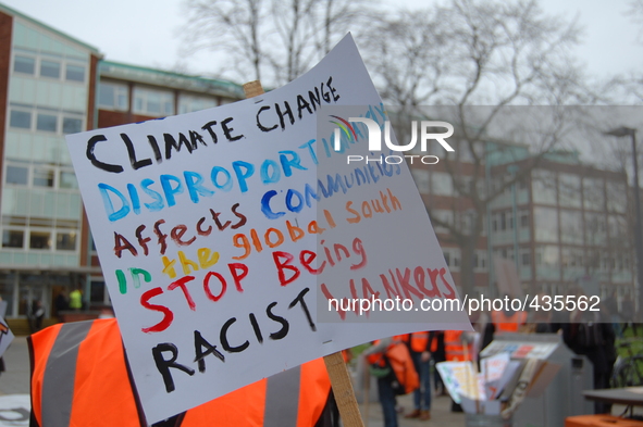 People demonstrating, on Friday 13th February, also known as Global Divestment Day, in central Manchester. The demonstrators were calling fo...