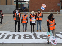 People demonstrating, on Friday 13th February, also known as Global Divestment Day, in central Manchester. The demonstrators were calling fo...