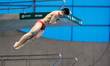 Zongyuan WANG of China competes in the Men's 3 meter Springboard finals during the last me...