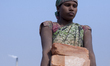 Dhaka,BangladeshWomen working in brick field.Millions of working women worldwide especi...