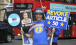 Pro and Anti Brexit campaigners are seen outside the Houses of Parliament, ahead of the Eu...