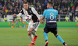 Federico Bernardeschi #33 of Juventus FC competes for the ball with Robin Gosens #8 of Ata...