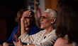 Dionne Warwick, (C), speaks to National Press Club (NPC) guests, after dinner and a privat...