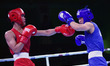 Indian boxer Jamuna Boro (red) in action against compatriot Y Sandhyarani in the finals bo...