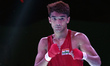 Indias boxer Shiva Thapa being declared winner after a bout in the 60 kg (Men) category ag...
