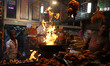 A Shopkeeper selling various Non-veg items, fries chicken pieces in New Delhi,  India, on...