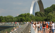 People walk on the newly opened footbridge in Kyiv, Ukraine, May 27,2019 