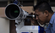 Indonesian observactory see the position of the moon using a telescope to determine the en...