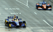 Alexander Rossi (27) of United States and Andretti Autosport drives on a wet track during...
