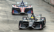 Spencer Pigot (21) of United States and Ed Carpenter Racing is pursued by Tony Kanaan (14)...
