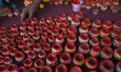 A potter painting clay toys on February 20, 2015 in Dhaka, Bangladesh. 
