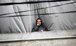 A child is seen from the balcony of his house on February 20, 2015 in the Shati refugee ca...