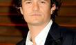 Orlando Bloom attend the 2014 Vanity Fair Oscar Party at the Sunset Tower Hotel hosted by...