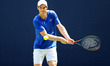 Andy Murray (GBR) plays a backhand in practice during the Fever Tree Tennis Championships...