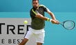 Marin Cilic (CRO) plays a backhand return during the Fever Tree Tennis Championships at th...