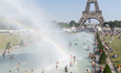 View from above of Parisians and tourists, adults and children alike, who swim in bathing...