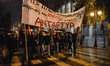 Protesters march to the Greek Parliament in central Athens during an anti-EU protest, on F...