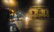A bus passes a burning bin in central Athens following clashes between riot police and pro...