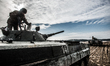 Cadets get into BMP-1 infantry fighting vehicle during training of driving armed vehicles...