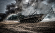 Cadets drive the BMP-1 infantry fighting vehicle during full-scale rehearsal of military m...