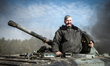 Cadet sits in his BMP-1 infantry fighting vehicle, which he calls 'Snizhok' (Snowball), du...