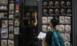 Protesters are seen putting up banners outside legco in Hong Kong, China. 30 June 2019. 