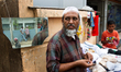 A street vendor selling his goods at the entrance of Shrine of Hazrat Shahjalal on Februar...