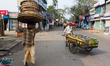 Man carrying their loads on February 27, 2015 at Jail Road in Bandarbazar, Sylhet, Banglad...