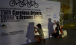 Participants wrote tribute words on a board to commemorate to Chilean cyclist, Juan Franci...
