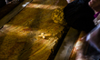 Catholic girl Pray in the Church of Holy Sepulchre on the anointing stone, in the old city...