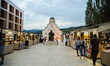 People are seen walking on the streets of the mock-village of Andricgrad, Visegrad, Bosnia...