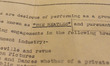 A Sotheby’s auction worker holds the original and first management contract between member...